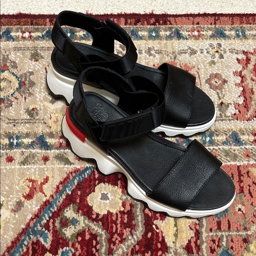 Sorel Black and White Sandals with Red Accent